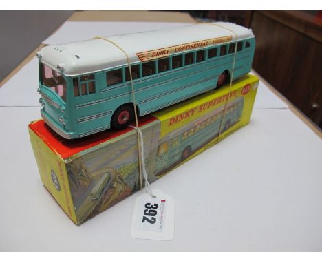 A Boxed Original Dinky #953 Continental Touring Coach, pale blue body, white roof, light brown interior, red plastic hubs. 'D