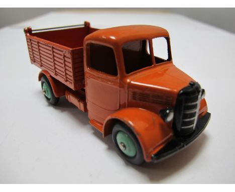 An Original Dinky #25M Bedford End Tipper Truck, rare colourway, orange cab, chassis and body, light green hubs. Model very g