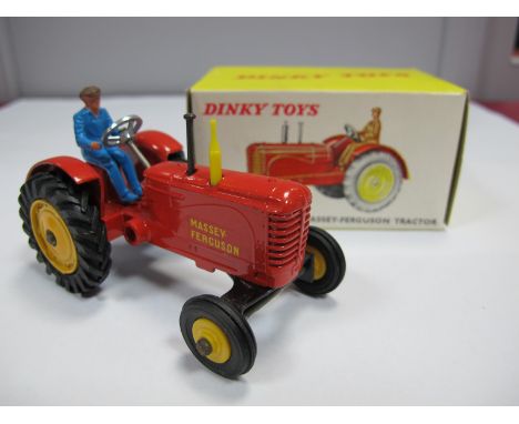 A Boxed Original Dinky #300 Massey Ferguson Tractor, red body, yellow hubs (cast rear, plastic front), rubber tyres, blue pla