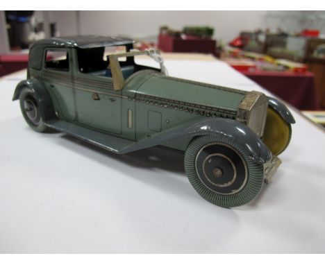 A Wells-Brimtoy Sedanca Style Tinplate Clockwork Car, blue/grey, with driver. Very good. Unboxed.