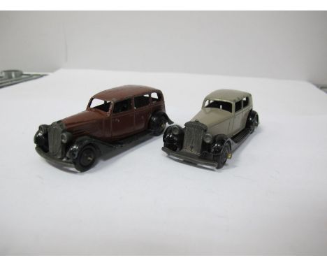 Two Original Dinky Saloon Cars #30c Daimler, fawn body, black running boards/guards, black ridged hubs, and #30D Vauxhall, br