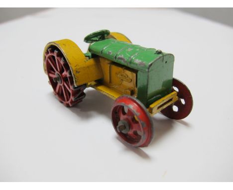 An Original Pre-War Dinky #22E Farm Tractor, 'Dinky Toys' cast in with hook, red wheels, green/yellow body. Chipping to body 