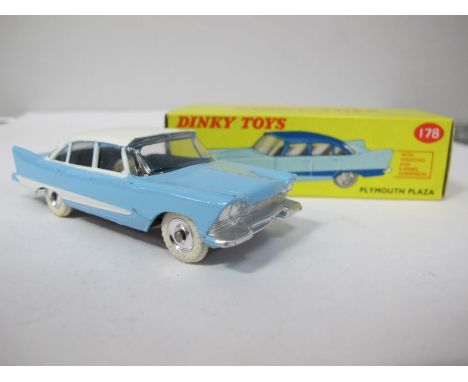 A Boxed Original Dinky #178 Plymouth Plaza, light blue body, white roof and flash, spun hubs, matt black base no number. Type