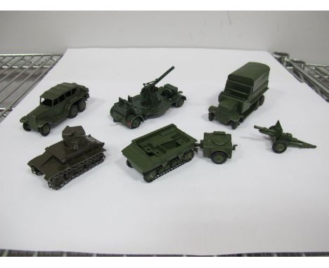 Seven Original Dinky Military Vehicles, #152A Pre War Light Tank, #305M Austin covered wagon, #152B reconnaissance car, ridge