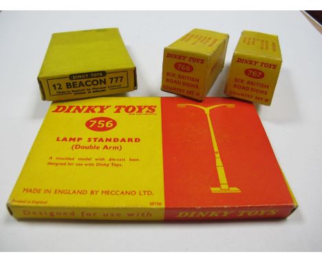 Four Boxed Original Dinky Accessories, #756 Lamp Standard (double arm), box missing two inner end flaps. #777 Belisha Beacon 