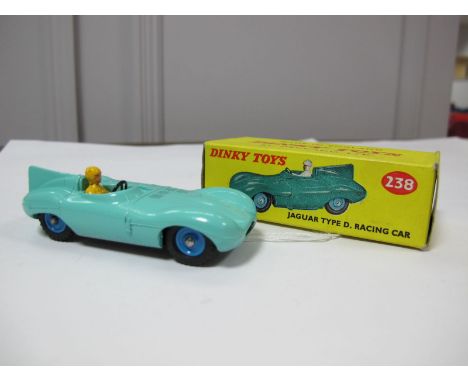 A Boxed Original Dinky #238 Jaguar 'D' Type, turquoise body and interior, yellow driver, blue plastic hubs, M tyres, black gl