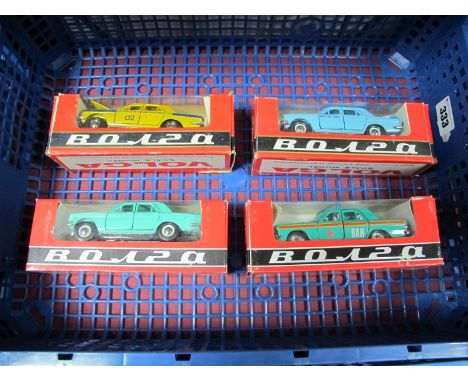 Four Boxed Russian Volga Novoexport 1:43rd Scale Diecast Cars, all different, all box fresh boxes with some rubbing. 