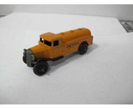 An Original Dinky #25D Petrol Tank Wagon, third type black chassis, light orange body, black ridged hubs, 'petrol' decals, so