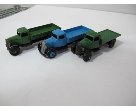 Three Original Dinky Wagons, #25A open wagon, type three black chassis, green body, black hubs, one #25A open wagon, type fou