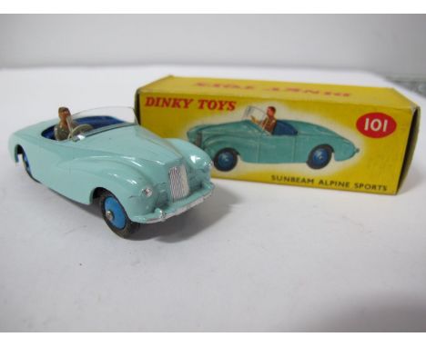 A Boxed Original Dinky #101 Sunbeam Alpine Sports, light blue body, dark blue interior, blue hubs, grey driver,black gloss no