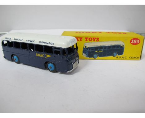A Boxed Original Dinky #283 B.O.A.C.Coach, dark blue/white body, light blue mist, B.O.A.C. intact decals model very good, box