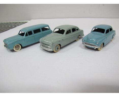 Three Original French Dinky Cars #24F Peugeot 403-U Familiale, light blue body, plated convey hubs #24X Ford Vedette, pale gr