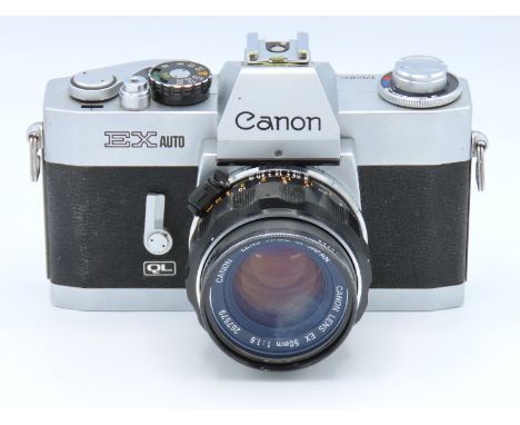 A Canon EX Auto QL 35mm film camera with Canon EX 50mm lens with leather V2 case, serial no. 176966