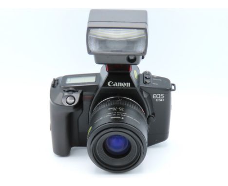 A Canon EOS 650 35mm film camera & manual with Canon EF 35-70mm Zoom lens & Canon Speedlite 300EZ flash case with box, serial