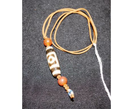 Tibetan ceramic bead pendant necklace painted cylindrical ceramic bead, on beaded string necklace.