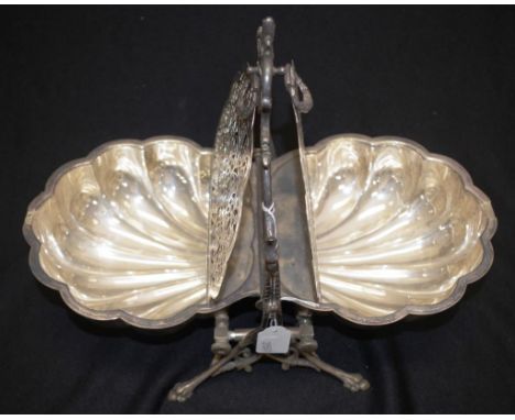 Vintage silver plate folding food server shell form folding server, opening to dual decorated dishes, on decorative silver pl