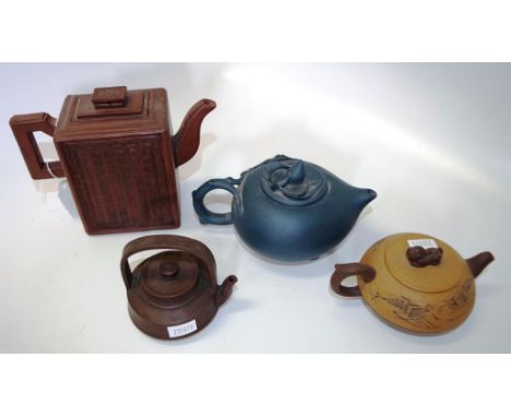 Four various Chinese Yixing ceramic teapots each with traditional decoration, with character mark to base, (height 13cm appro