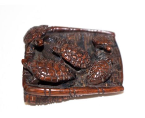 Japanese carved tortoise netsuke carved group of 5 tortoises, signed to base, (width 4.5cm approx).