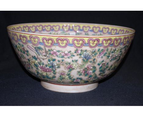Large Chinese painted ceramic bowl painted bird and blossom decoration to interior and exterior, character marks to base, (he