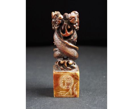 Good carved stone Chinese seal well carved dragon figure to top, with engraved characters to base, character mark signature b