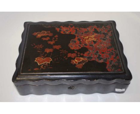 Vintage lacquer games box decorated lacquer lid opening to fitted interior, with 4 lidded sections containing gaming pieces, 