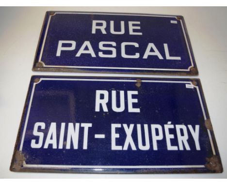 Two good French enamel on steel street signs each of blue enamel with white figures, including: 'Rue Pascal,' and 'Rue Saint-