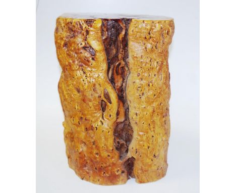 Chinese hardwood stand made from a portion of tree trunk, with finished and polished top, 29cm x 23cm, 41cm high approx. NB T
