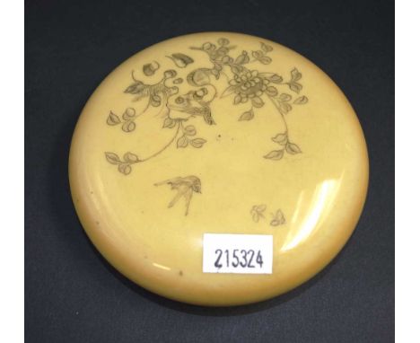 Oriental erotic lidded circular dish lid with engraved bird and blossom decoration, opening to 2 carved erotic figures to int