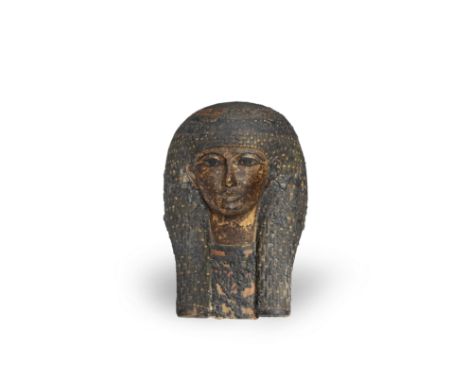  An Egyptian polychrome painted cartonnage mummy mask  Ptolemaic Period, circa 2nd-1st Century B.C.Wearing a tripartite echel