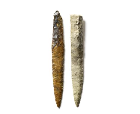  Two Danish flint daggers Late Neolithic Period, circa 2000-1700 B.C.Comprising a slender blade of grey flaked flint with squ