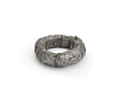  A Roman silver bracelet Probably Eastern Mediterranean, circa 250-300 A.D.With a bitumen core, one shorter side openable by 