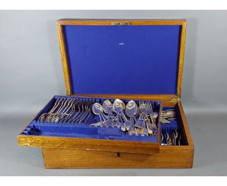 A silver plated canteen of flatware within oak box 