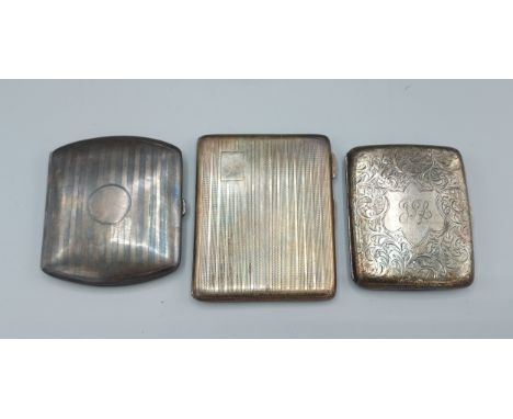 A Birmingham silver cigarette case with engine turned decoration together with two other Birmingham silver cigarette cases 