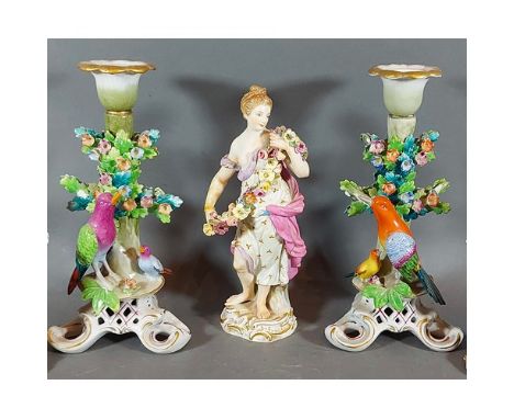 A Meissen porcelain model in the form of a classical lady, 20cms talltogether with a pair of Sitzendorf candlesticks, 20cms t