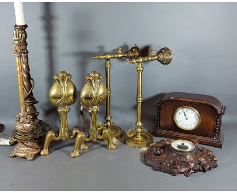 A Pair of Brass Fire Dogs, together with a pair of lamps, a clock, a barometer and two table lamps 