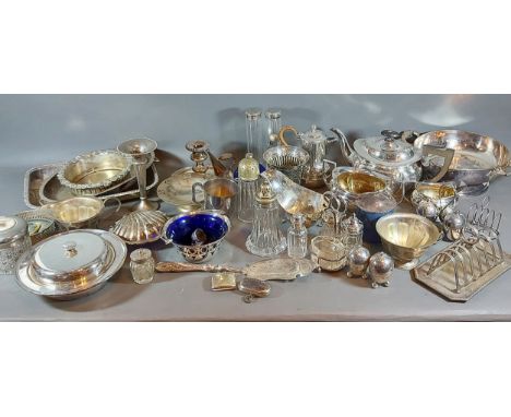 A silver plated three piece tea service together with a collection of silver plated items to include flatware 