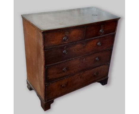 A 19th century oak chest, the moulded top above two short and three long drawers raised upon bracket feet, 92cms wide, 47cms 