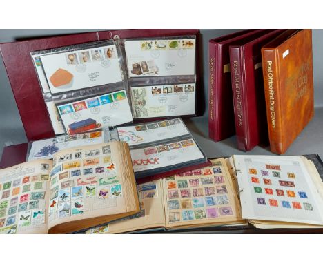 A Stamp collection within three albums GB and foreign together with five albums of First Day Covers 