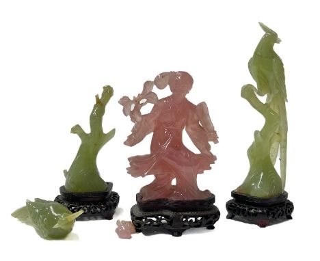 A small collection of jade-type and rose quartz-type carved figurines on stands, two birds and a seated woman (3)