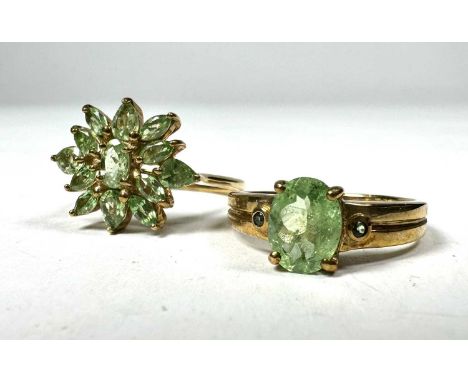 A 9ct gold green garnet cluster ring and a 9ct gold green garnet single-stone ring, hallmarks for Birmingham 2005, ring sizes