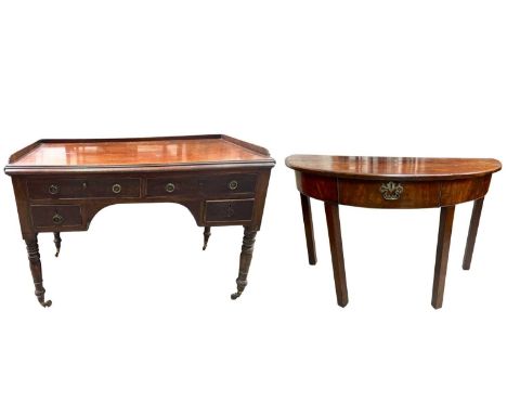 An 18th century mahogany demilune console table, single drawer with brass escutcheon and handle, h-73cm, w-122cm, also a writ