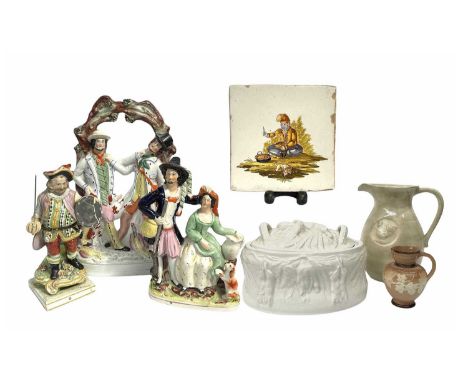 A Pearlware 'Falstaff' figurine together with two 19th century Staffordshire figure groups, glazed, tallest at 33cm high, tog