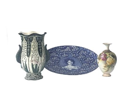 A Royal Worcester vase, c.1900, Hadley shape 302, the ovoid body decorated with hand enamelled rose sprays below stiff leaf m