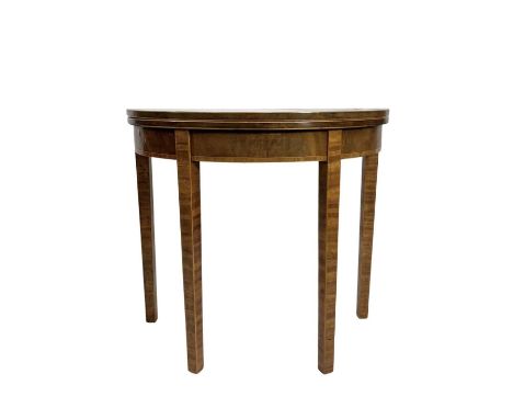 A small Sheraton style sunburst mahogany veneered demilune fold over card table, green baise to the open table, h-74cm, w-84c