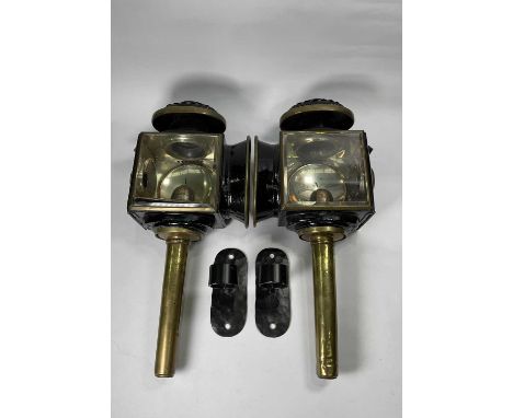 Pair of late 19th or early 20th century carriage or coaching lamps, base of candle holders engraved 'Lawton £ Co. Liverpool, 
