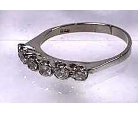 An brilliant-cut diamond half eternity ring, estimated total diamond weight 0.30ct, band stamped 750, ring size O1/2, 2.7g