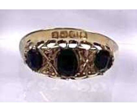 An Edwardian 18ct gold sapphire three-stone ring, with rose-cut diamond spacers, hallmarks for Birmingham 1906, ring size M, 
