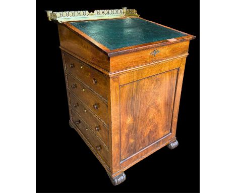 A William IV Rosewood davenport desk possibly Gillows, with tooled green leather writing slope with two pull outs to sides op
