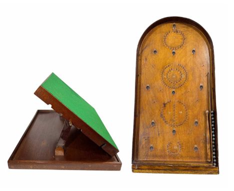 V An early-mid 20th Jaques London century bagatelle board, 76cm long together with a folding tilting puzzle board, 45 by 56cm