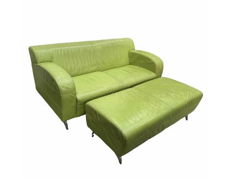 A lime green leather upholstered two seated sofa and foot stool, circa 2000, with aluminium horn shaped legs, fire labels, 16